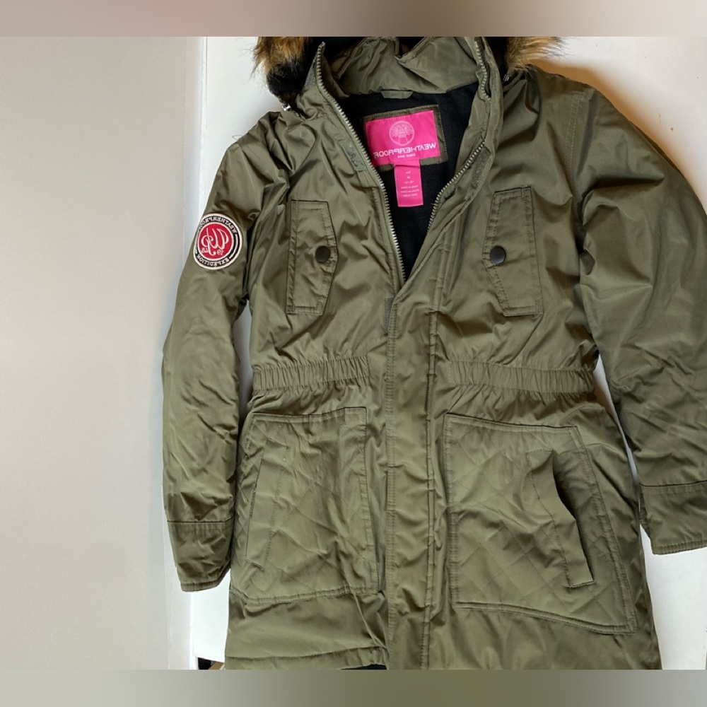 Weatherproof women’s Army green jacket with hood and faux fur lining